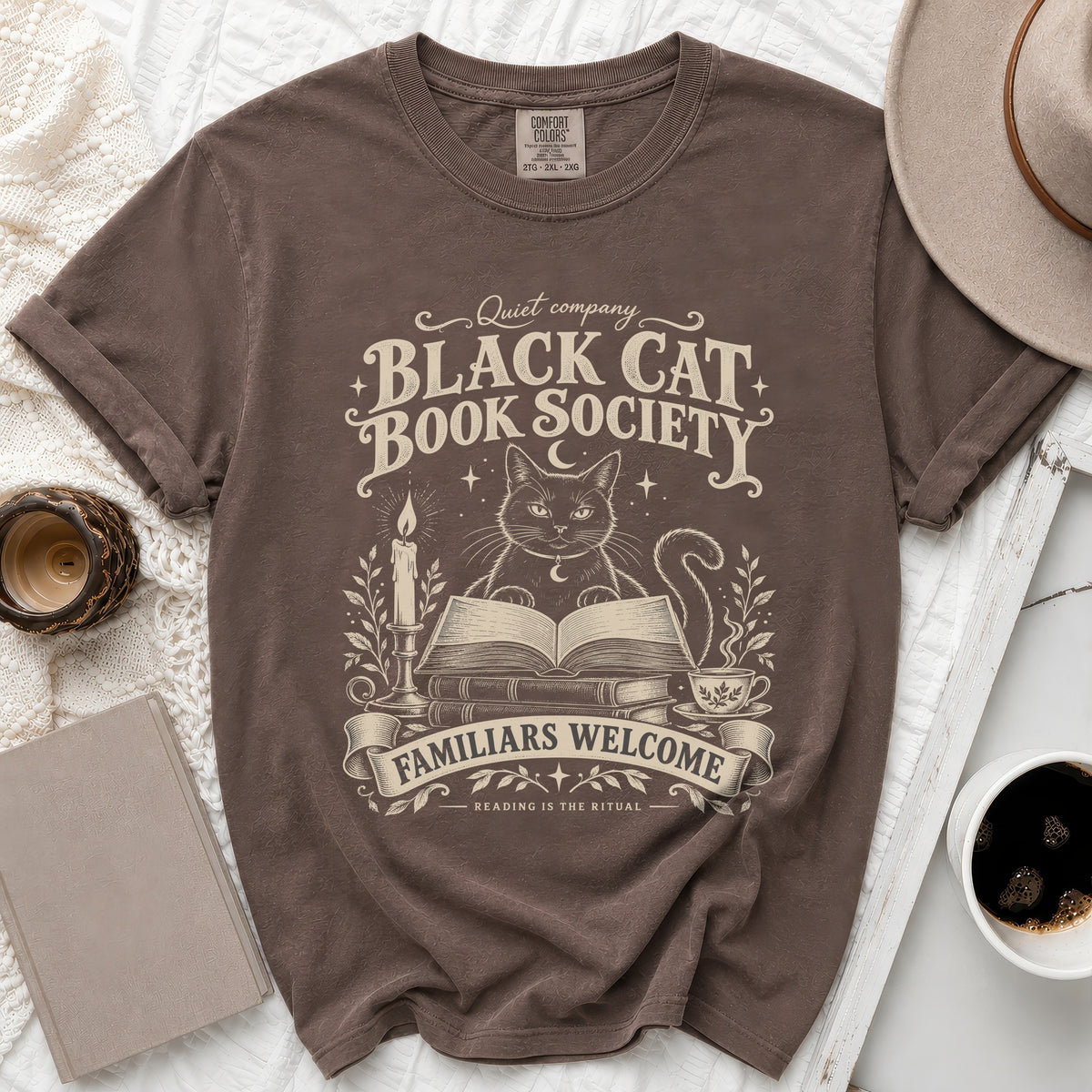 Brown t-shirt with "Black Cat Book Society" design, featuring a cat and books.