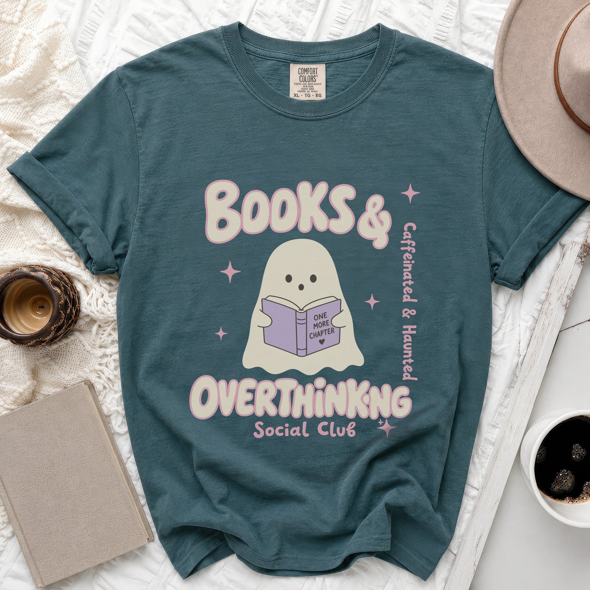 Teal t-shirt with ghost graphic reading "Books & Overthinking Social Club".