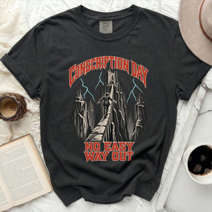Black crewneck t-shirt featuring a fantasy graphic of a person walking across a narrow stone bridge toward a castle, accompanied by the text "Conscription Day" and "No Easy Way Out".