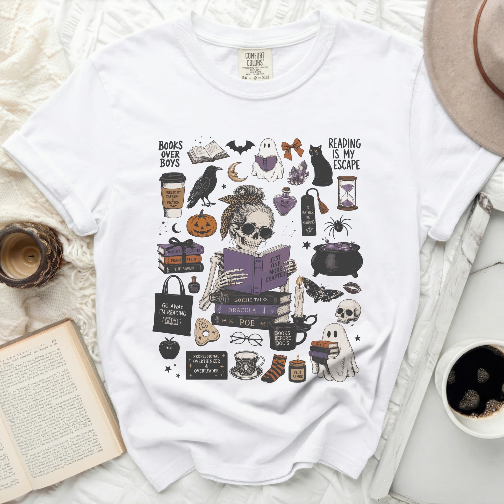 White t-shirt with Halloween-themed book and reading graphics