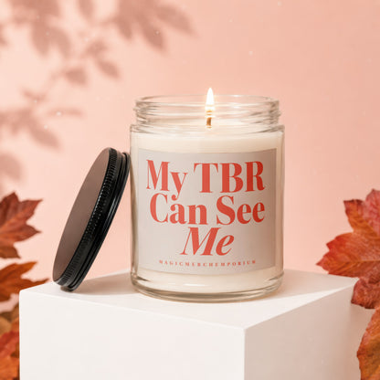 Candle with text "My TBR Can See Me" and "MagicMerchEmporium" on a pedestal.