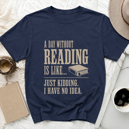 Navy t-shirt with "A day without reading is like... Just kidding. I have no idea." text.