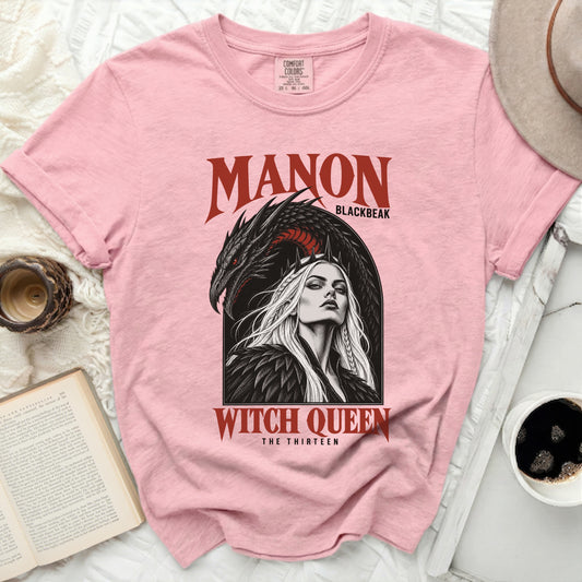 Pink t-shirt with Manon Witch Queen and dragon graphic and text.