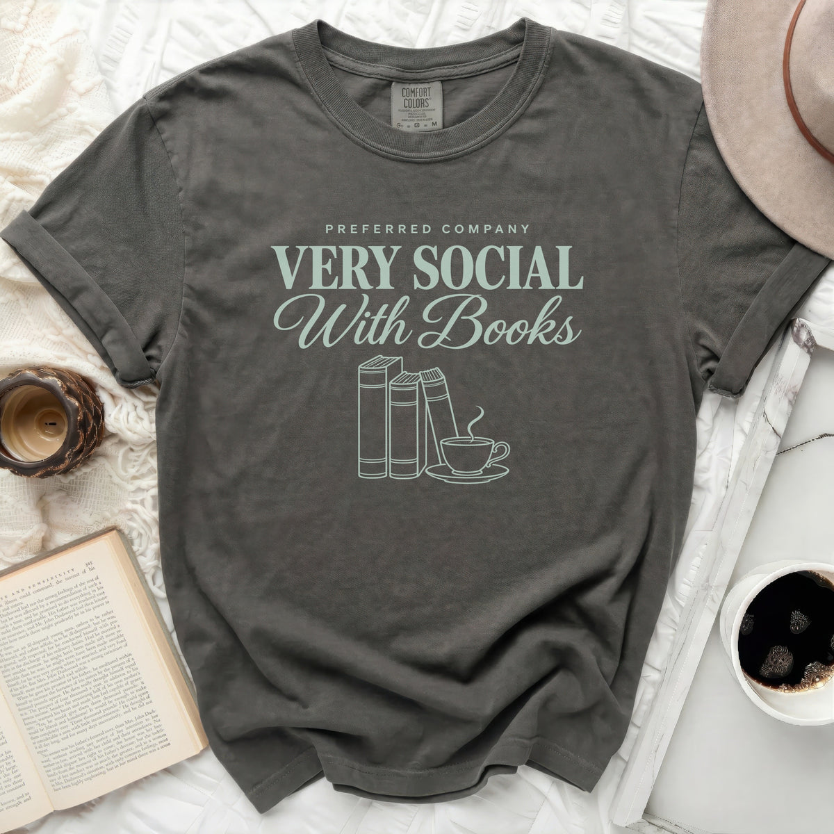Dark grey t-shirt with "VERY SOCIAL With Books" text and book illustration.