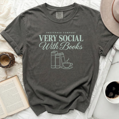 Dark grey t-shirt with "VERY SOCIAL With Books" text and book illustration.