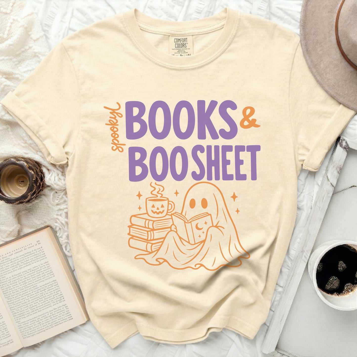Spooky books and boo sheet graphic with ghost and books.