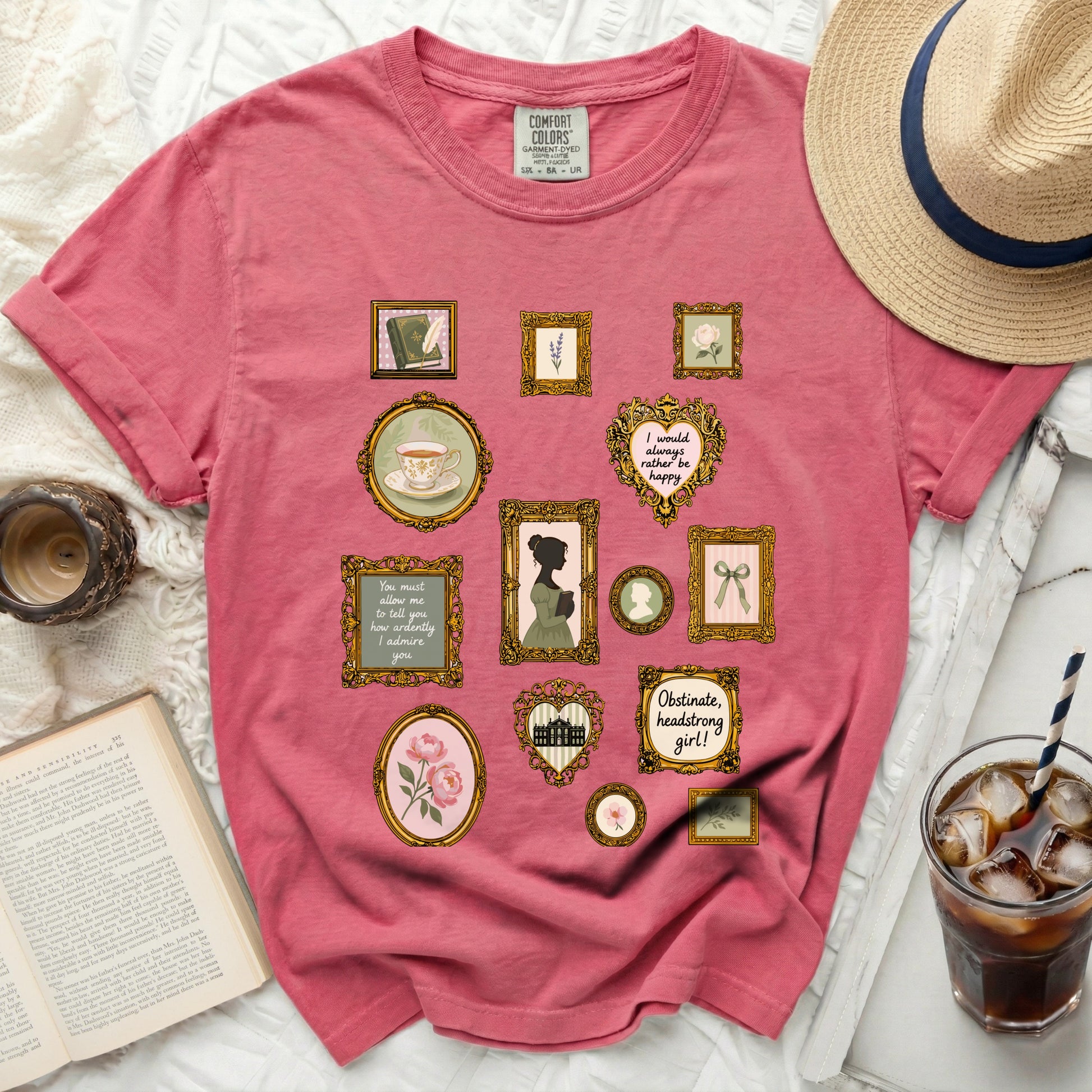 Pink t-shirt with framed vintage illustrations and quotes.