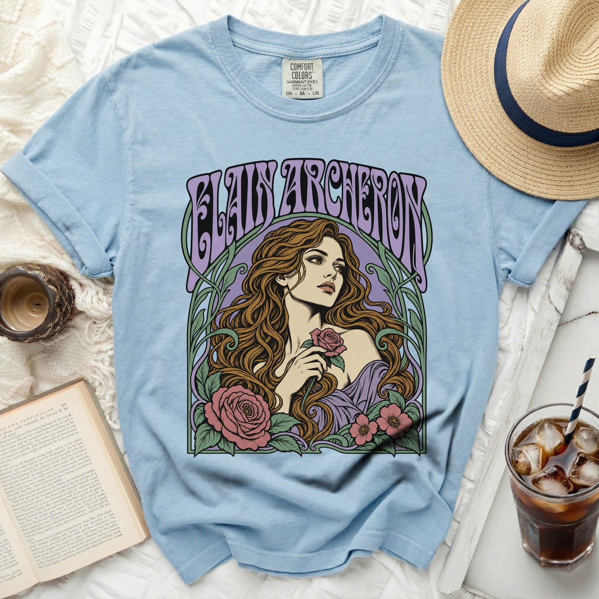 Light blue t-shirt with "Elain Archeron" text and woman with roses graphic.