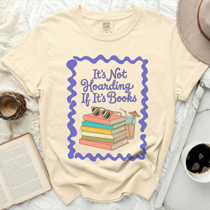 Comfort Colors t-shirt with "It's Not Hoarding If It's Books" graphic.