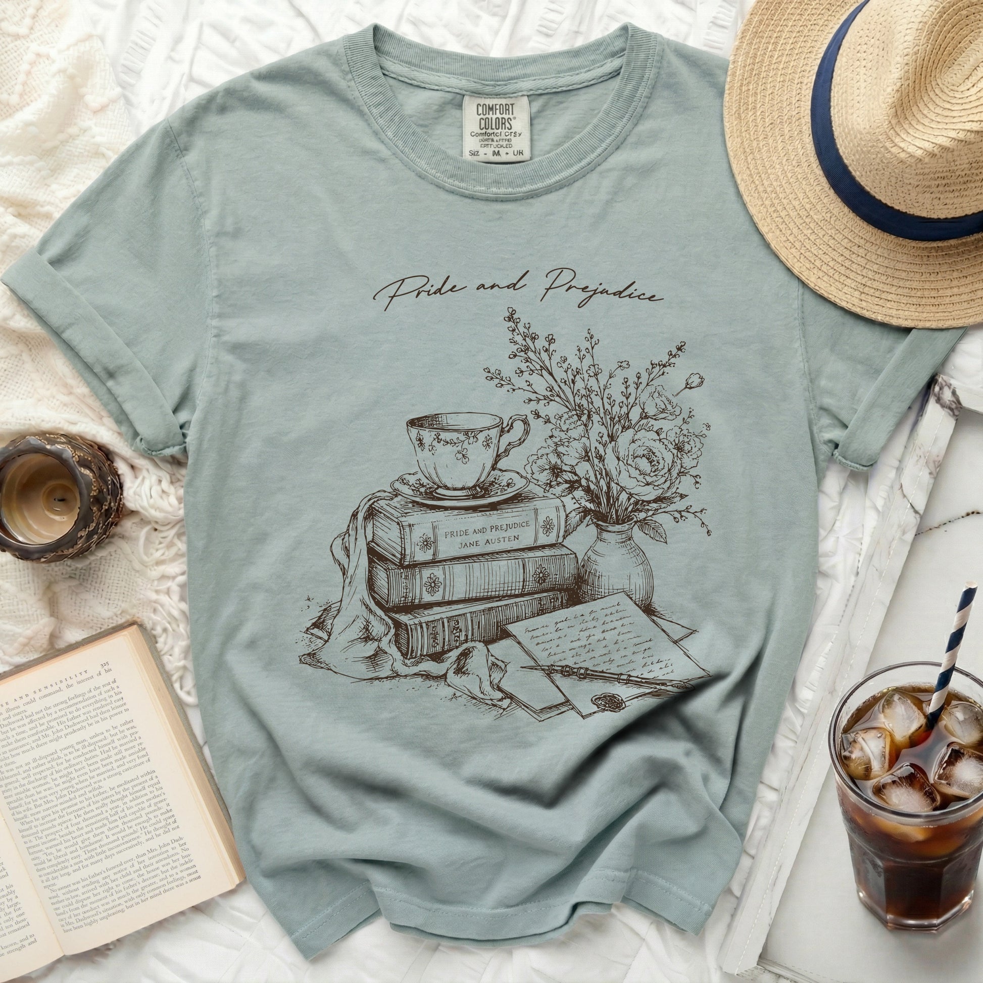 T-shirt with "Pride and Prejudice" text and literary sketch.