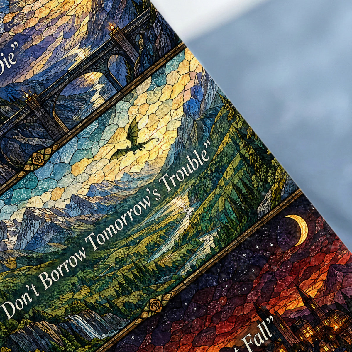 Close-up of a stained-glass design depicting a bridge, landscape with a dragon, and text reading "Don't Borrow Tomorrow's Trouble".