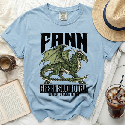 Light blue t-shirt with "FANN" and "GREEN SWORDTAIL" text and a green dragon design.