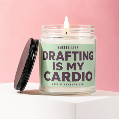 Candle with "Drafting Is My Cardio" text on a mint green label.