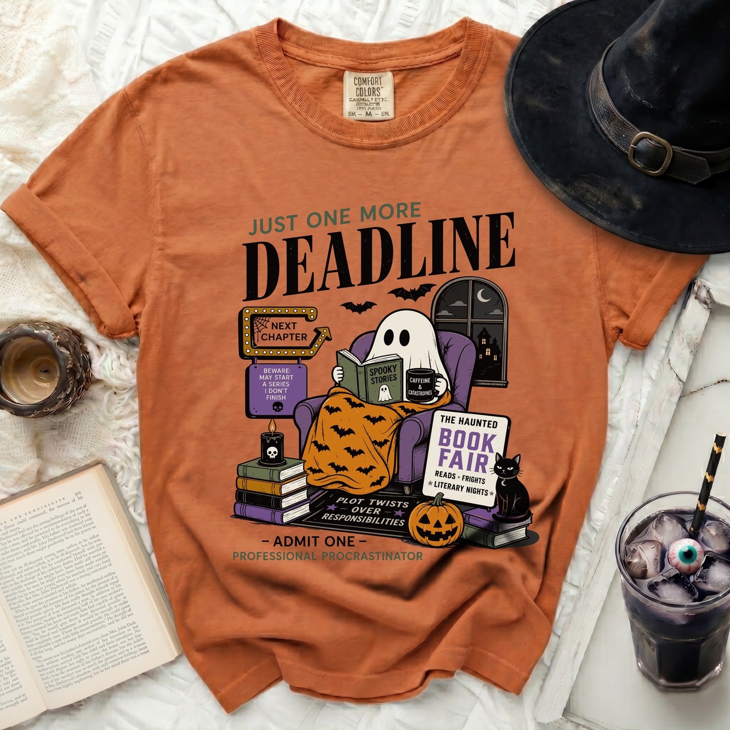 Orange t-shirt with ghost reading, "Just One More Deadline" and "Professional Procrastinator."
