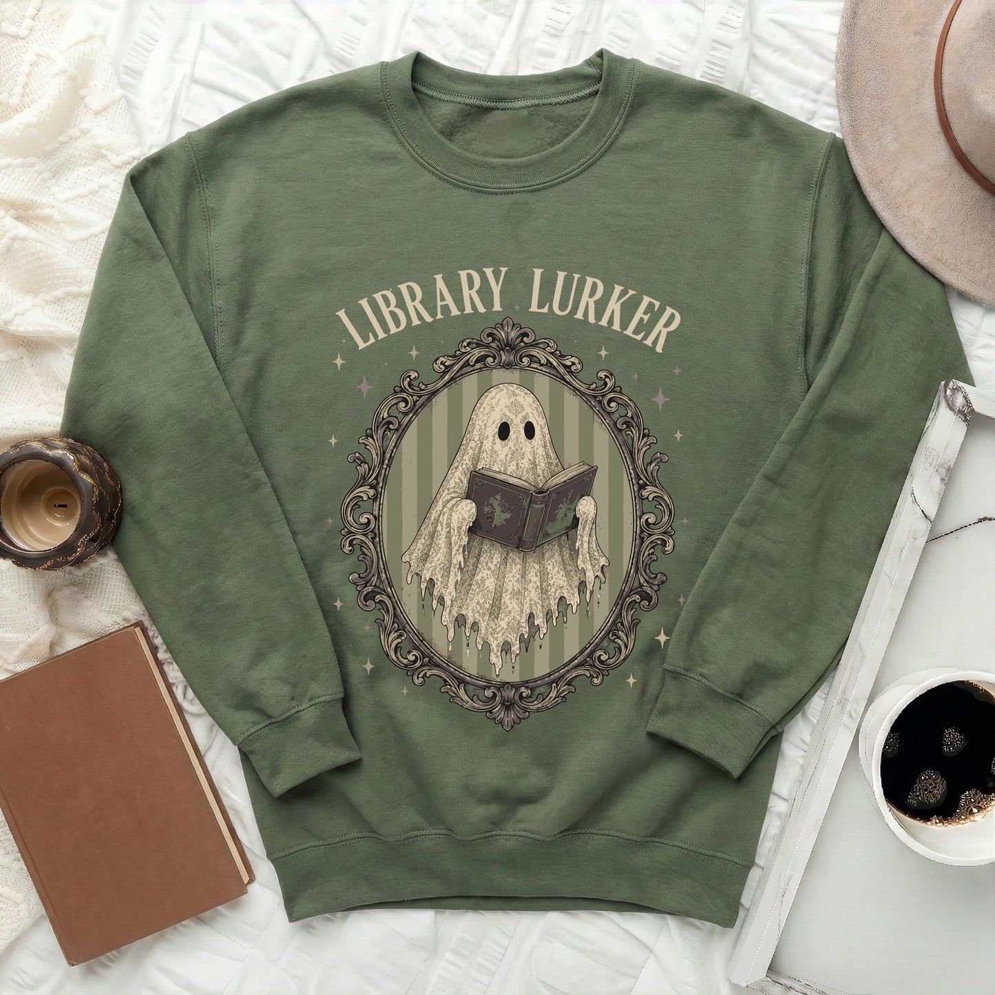 Olive green sweatshirt with "Library Lurker" text and a ghost reading a book.