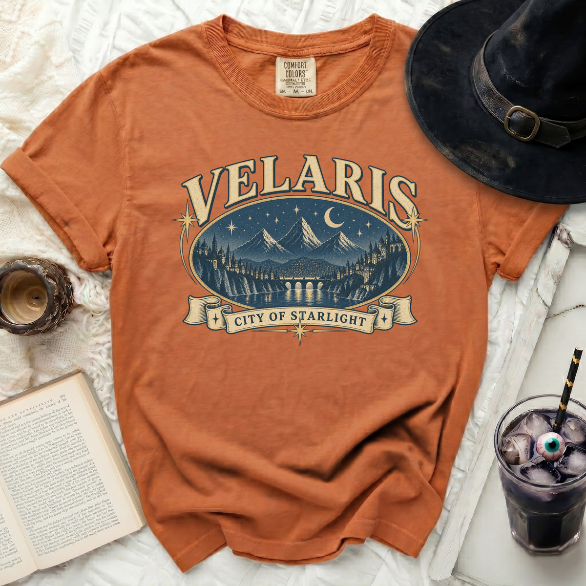 Orange t-shirt with Velaris City of Starlight graphic and Comfort Colors tag.