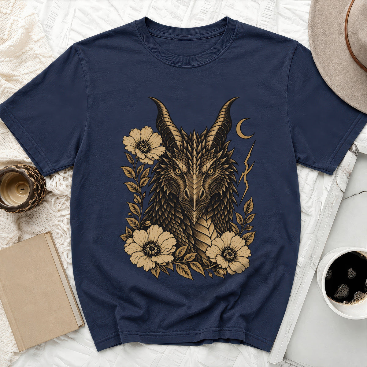 Navy t-shirt with a distressed golden dragon head design and flowers.