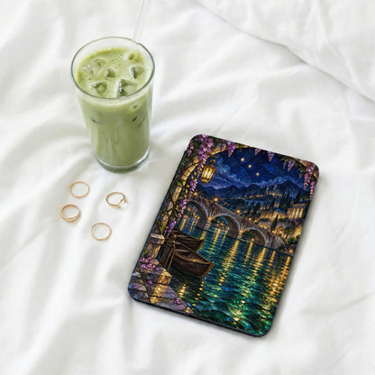 Tablet case with a stained glass bridge scene at night.