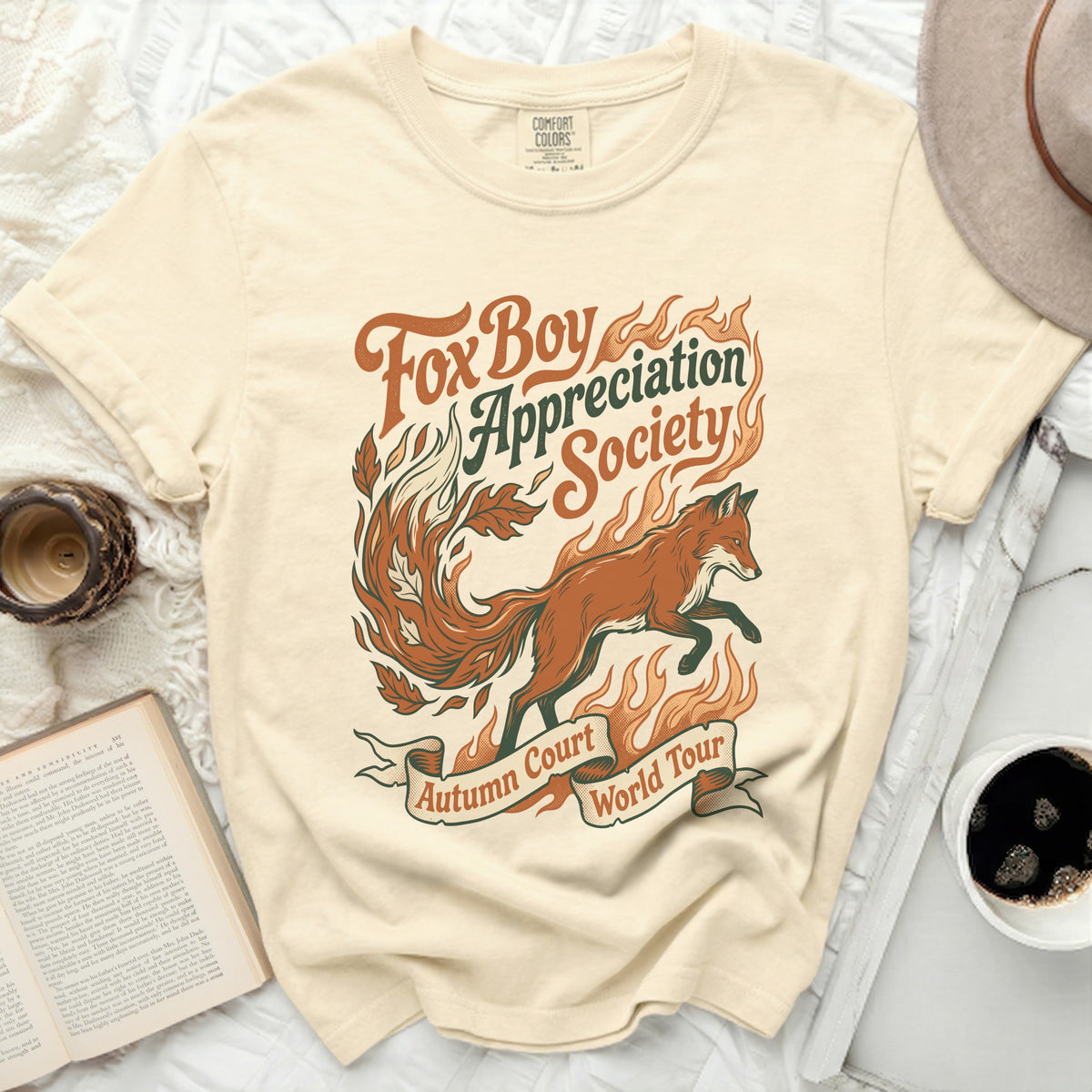 Cream t-shirt with "Fox Boy Appreciation Society Autumn Court World Tour" graphic.