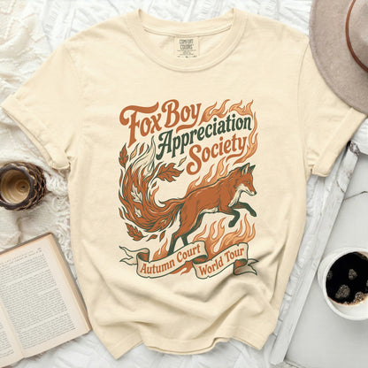 Cream t-shirt with "Fox Boy Appreciation Society Autumn Court World Tour" graphic.