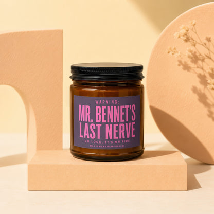 Amber jar candle with a purple label reading "Mr. Bennet's Last Nerve."