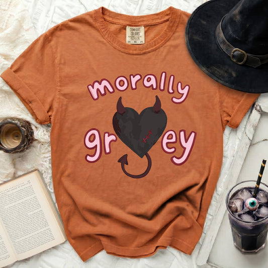 Orange t-shirt with "morally grey" text and a black heart with horns.