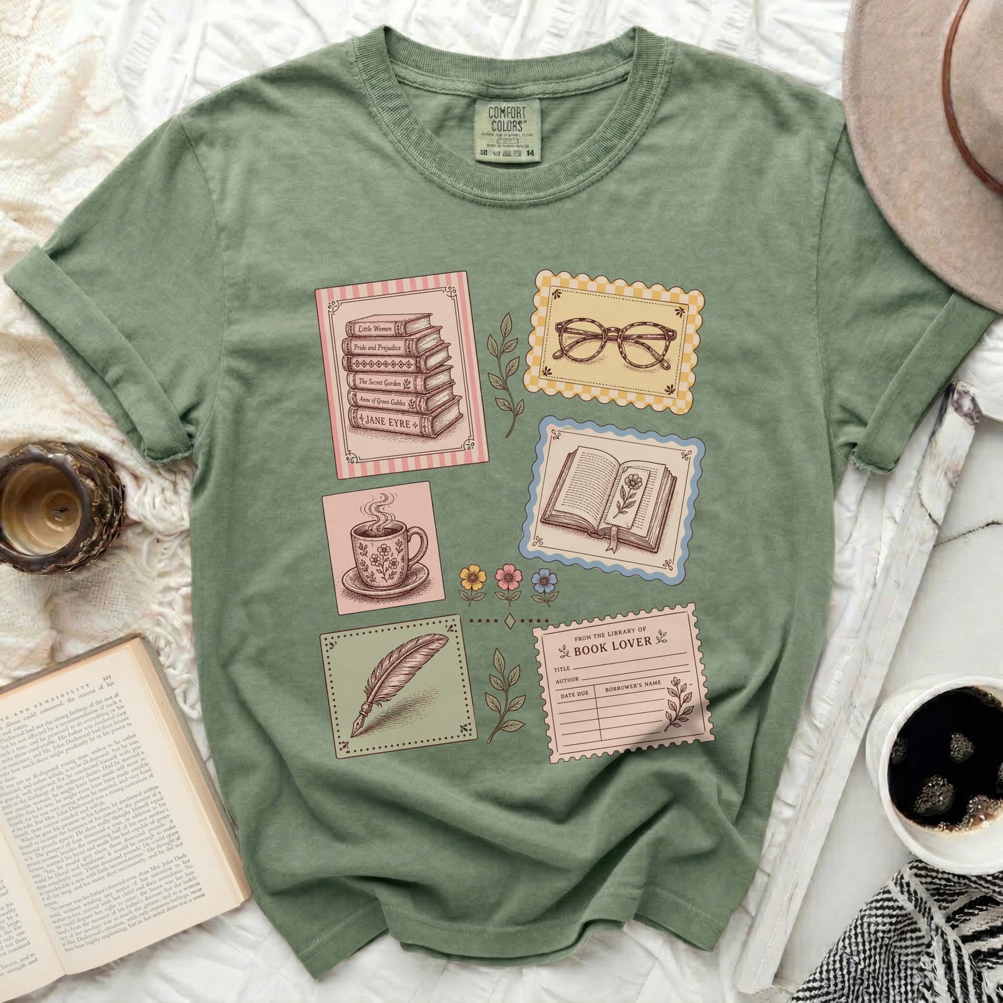 T-shirt with vintage book illustrations and library card graphic.