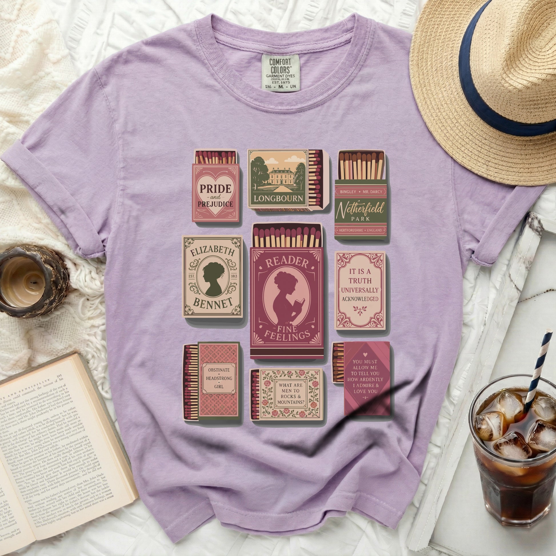 Purple t-shirt with literary matchbox designs: Pride and Prejudice.