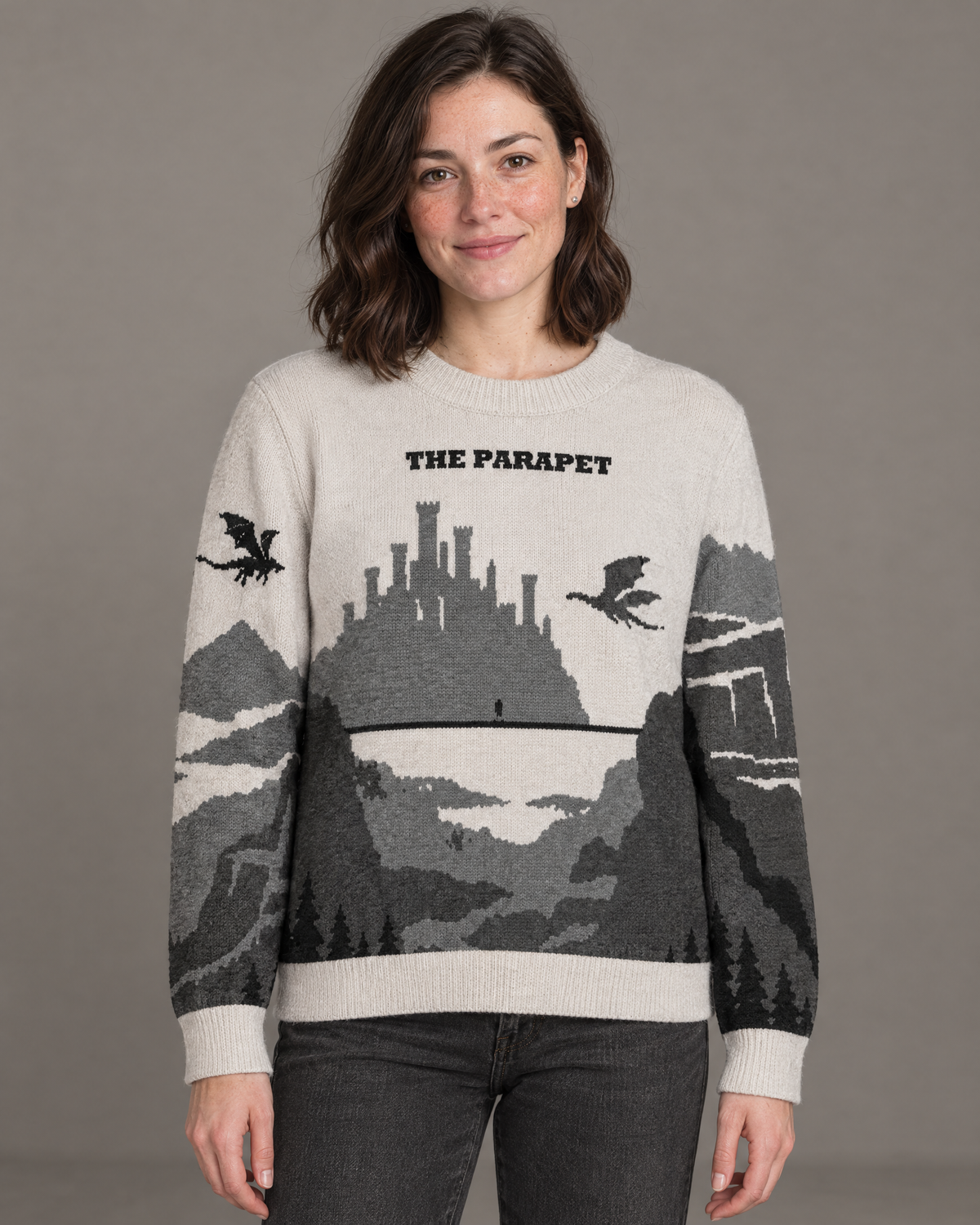 The Parapet knitted sweater, front with castle, dragon and bridge