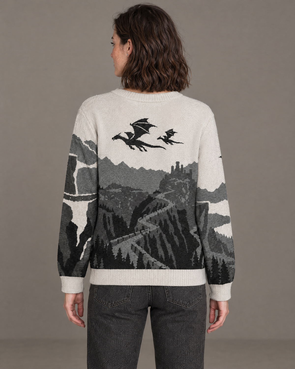 The Parapet knitted sweater, back with two dragons in flight