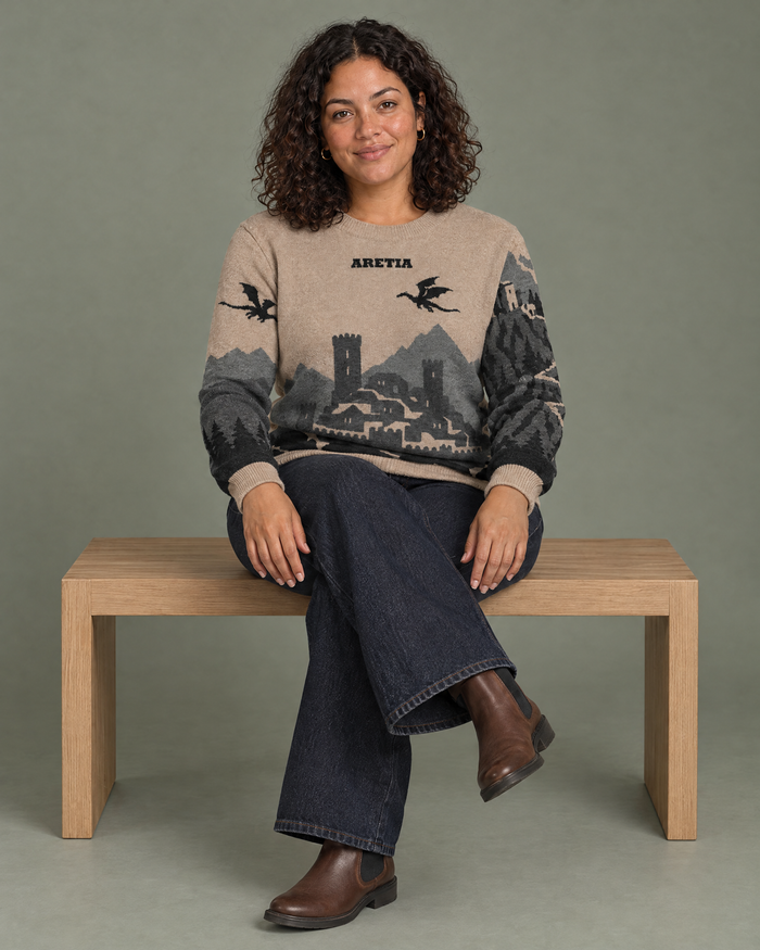 Aretia knitted sweater, seated