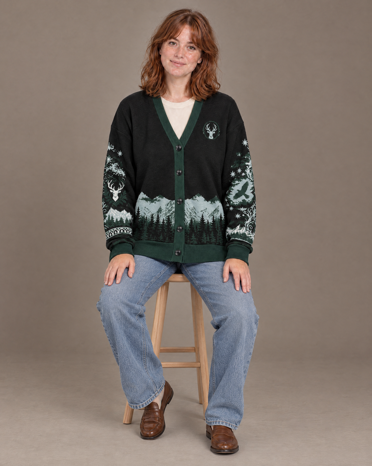 Terrasen Stag Knitted Cardigan seated