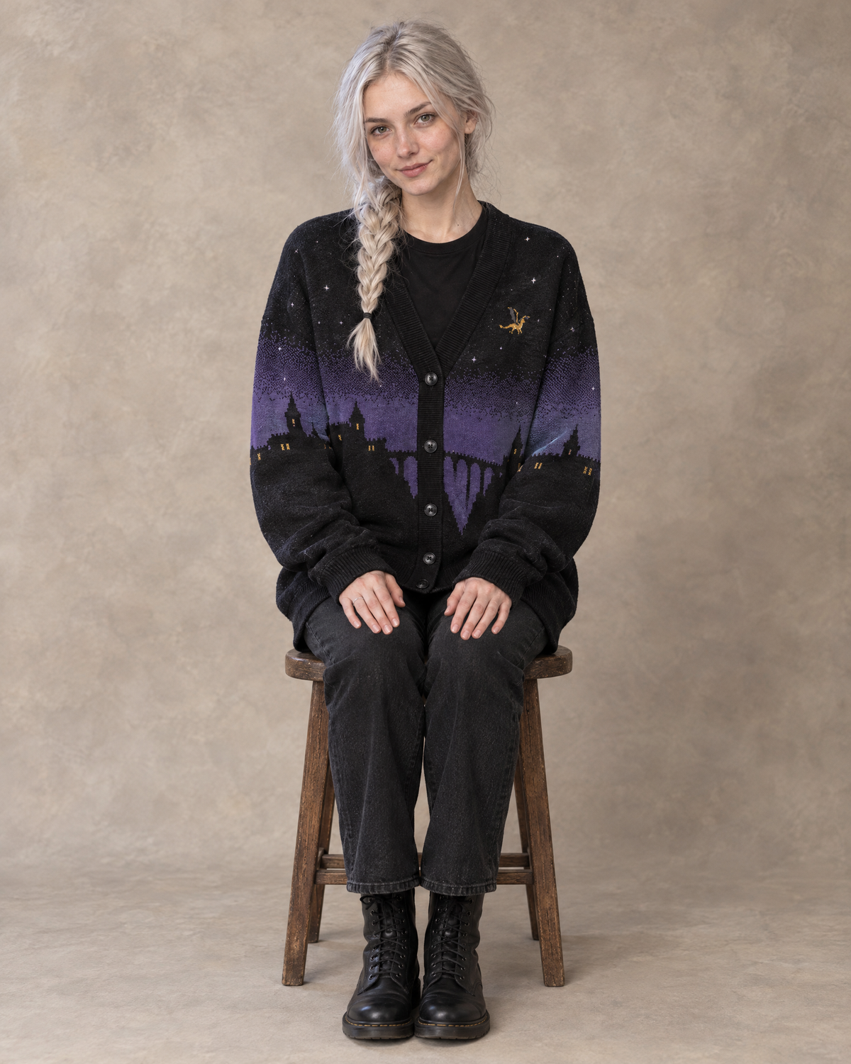 Fly or Die Basgiath Night Knitted Cardigan, seated