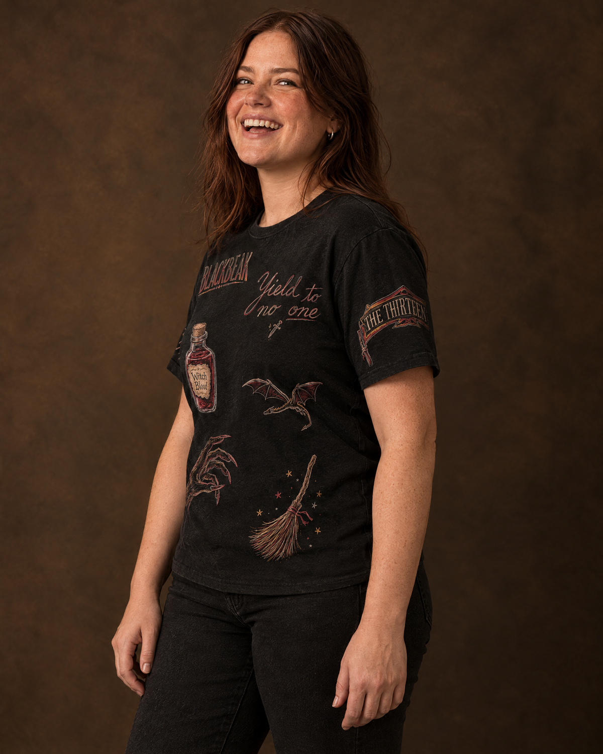Manon and the Thirteen Doodles Tee, three-quarter view with sleeve