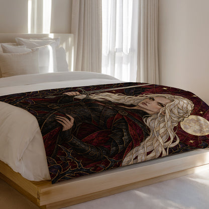 Iron Queen Velveteen Plush Blanket on a bed