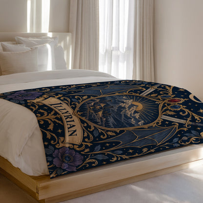 Illyrian Crest Velveteen Plush Blanket on a bed