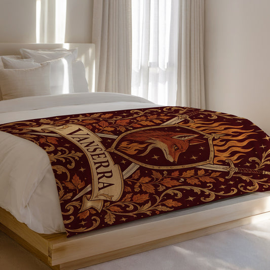 Vanserra Crest Velveteen Plush Blanket on a bed