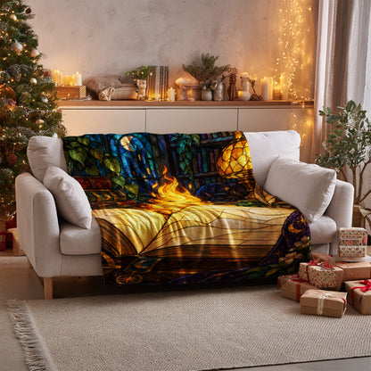 Ember Velveteen Plush Blanket on a sofa