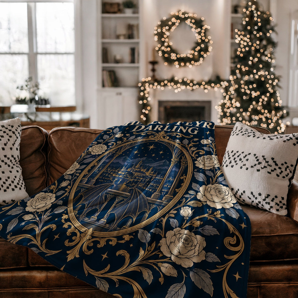 Hello Feyre Darling Crest Velveteen Plush Blanket on a couch