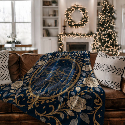 Hello Feyre Darling Crest Velveteen Plush Blanket on a couch