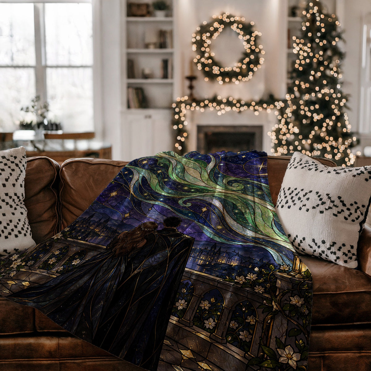 Starfall Stained Glass Velveteen Plush Blanket on a couch