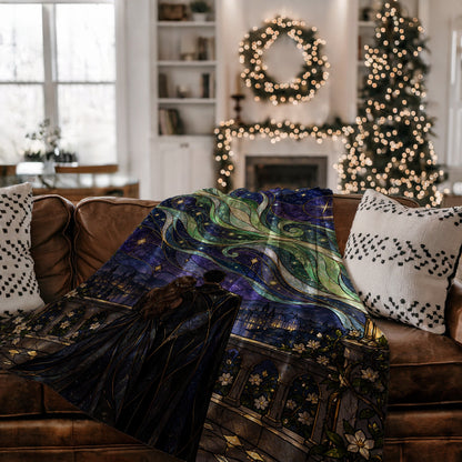 Starfall Stained Glass Velveteen Plush Blanket on a couch