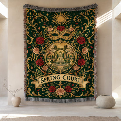 Spring Court Masquerade Crest Woven Throw Blanket hanging on a wall