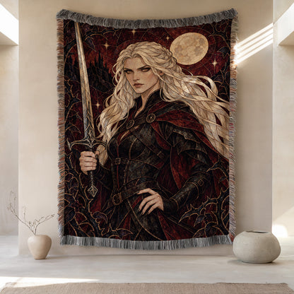 Iron Queen Woven Throw Blanket hanging on a wall