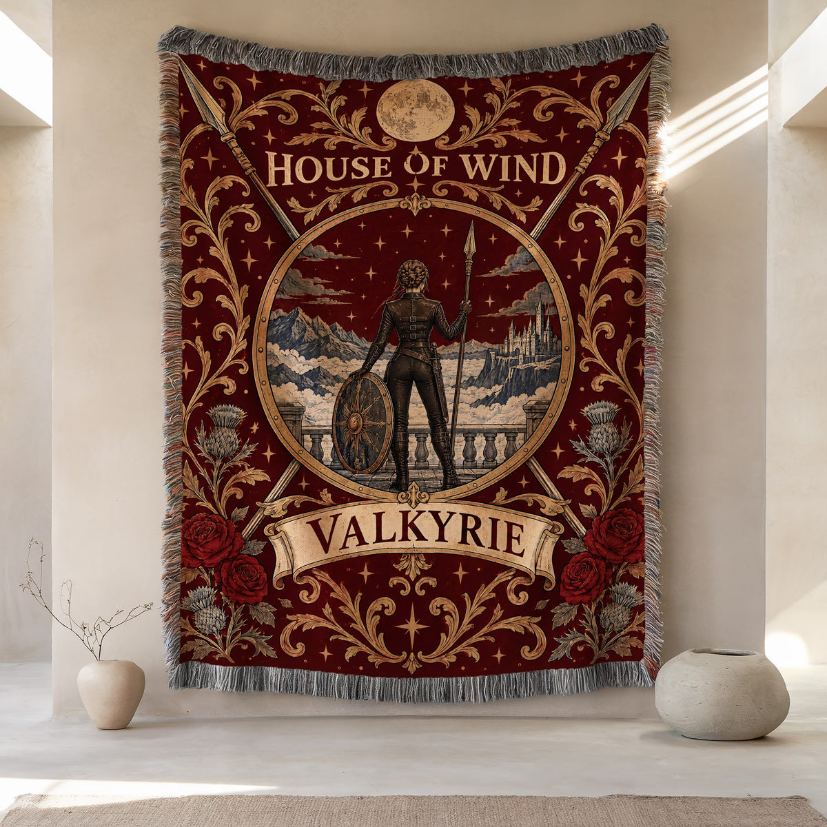 Valkyrie House of Wind Crest Woven Throw Blanket hanging on a wall