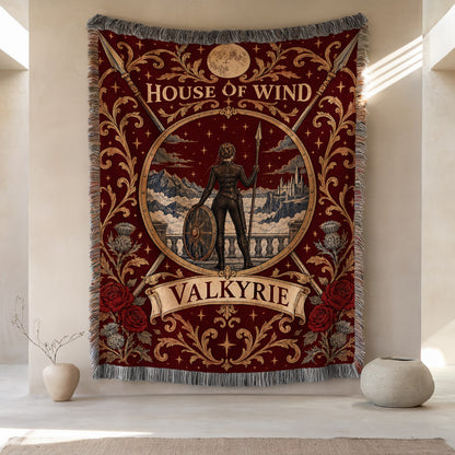 Valkyrie House of Wind Crest Woven Throw Blanket hanging on a wall