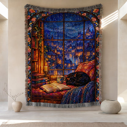 The Reader's Window Stained Glass Woven Throw Blanket hanging on a wall