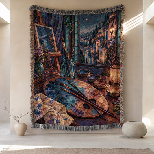 The Rainbow of Velaris Woven Throw Blanket hanging on a wall