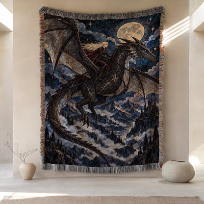 Above the Storm Woven Throw Blanket hanging on a wall