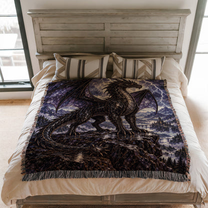 Storm Tairn Woven Throw Blanket on a bed